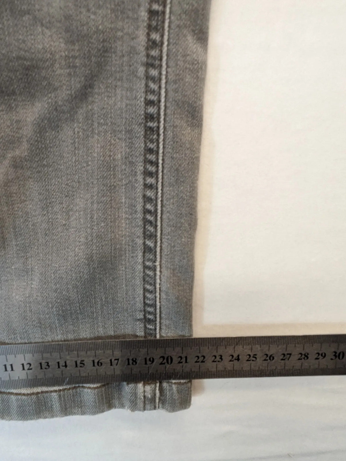 BRAX grey straight jeans with classic 5-pocket style and washed denim finish.