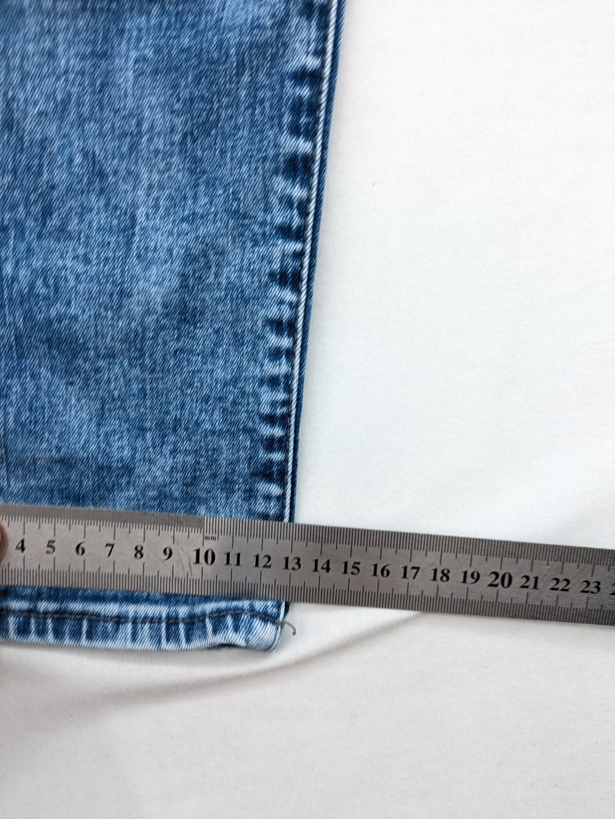 Retour blue slim fit jeans with classic 5-pocket style and adjustable waistband.
