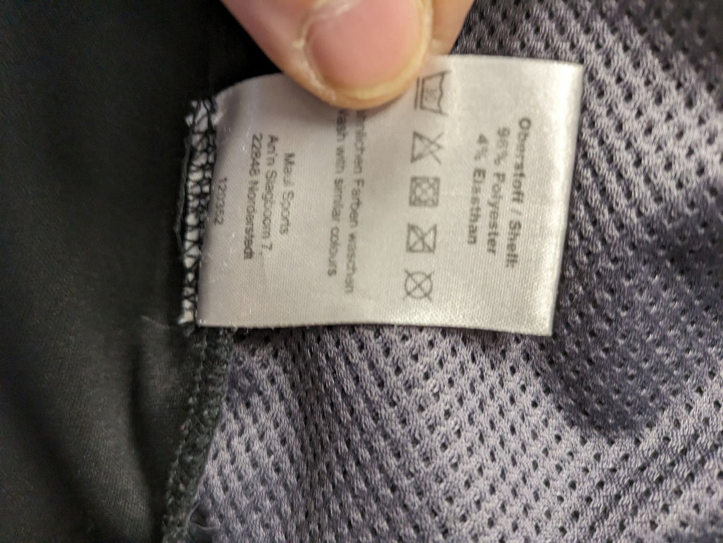 Maui Sports grey softshell jacket XL with contrasting yellow zipper and multiple pockets.