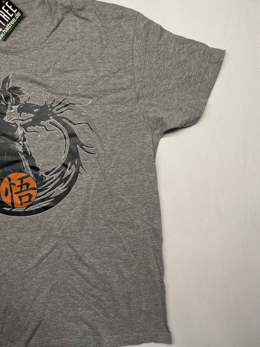 Dragon Ball Z grey t-shirt featuring Son Goku graphic print and "Go" Kanji symbol.