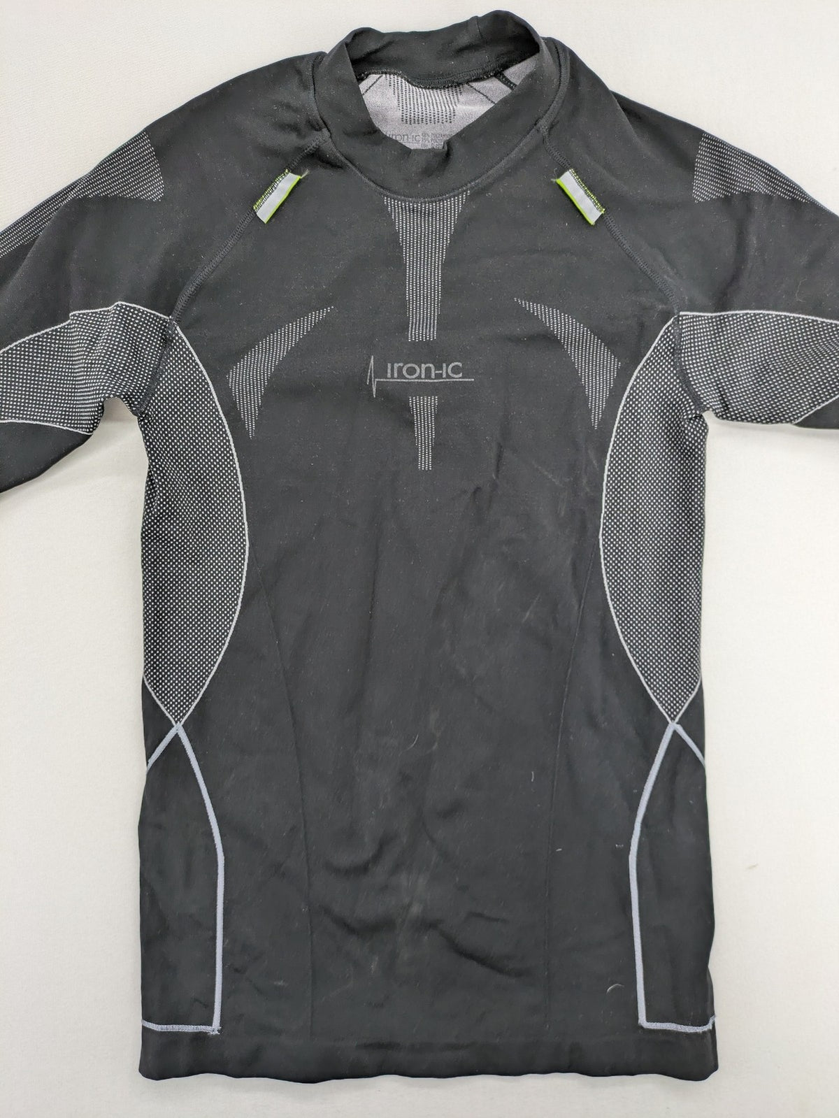 Iron-ic black long sleeve baselayer top with standing collar and thumbholes.