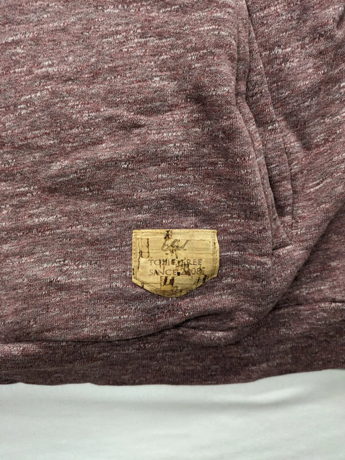 Bleed turtle neck jumper grey burgundy colorblock design with adjustable hood and kangaroo pocket.