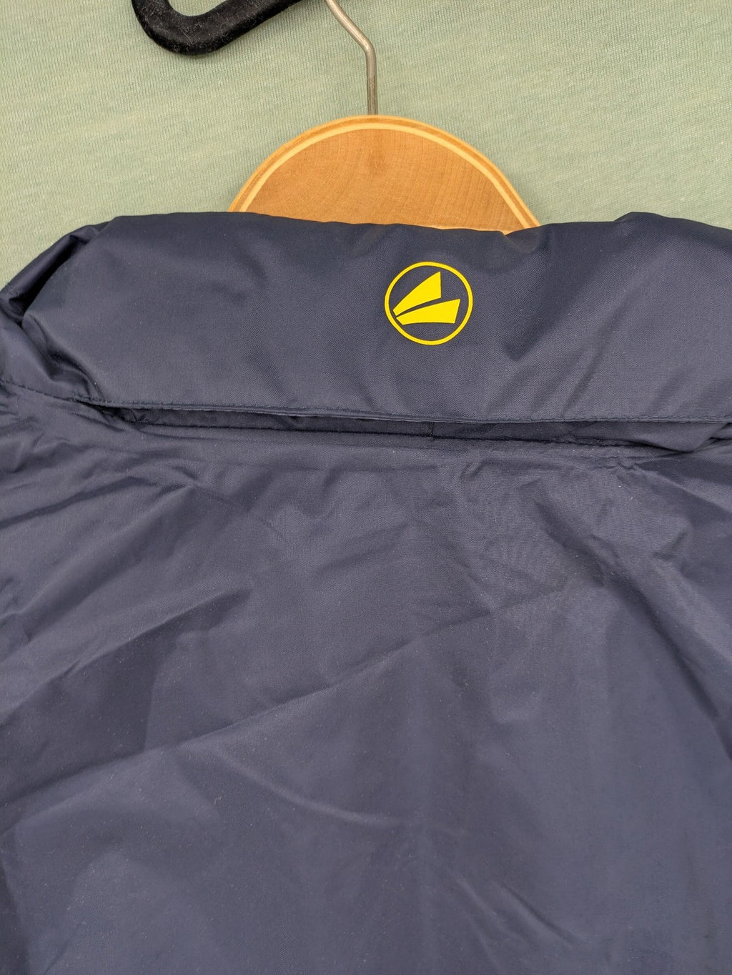 Jako navy windbreaker full zip jacket with breathable mesh lining and logo details.
