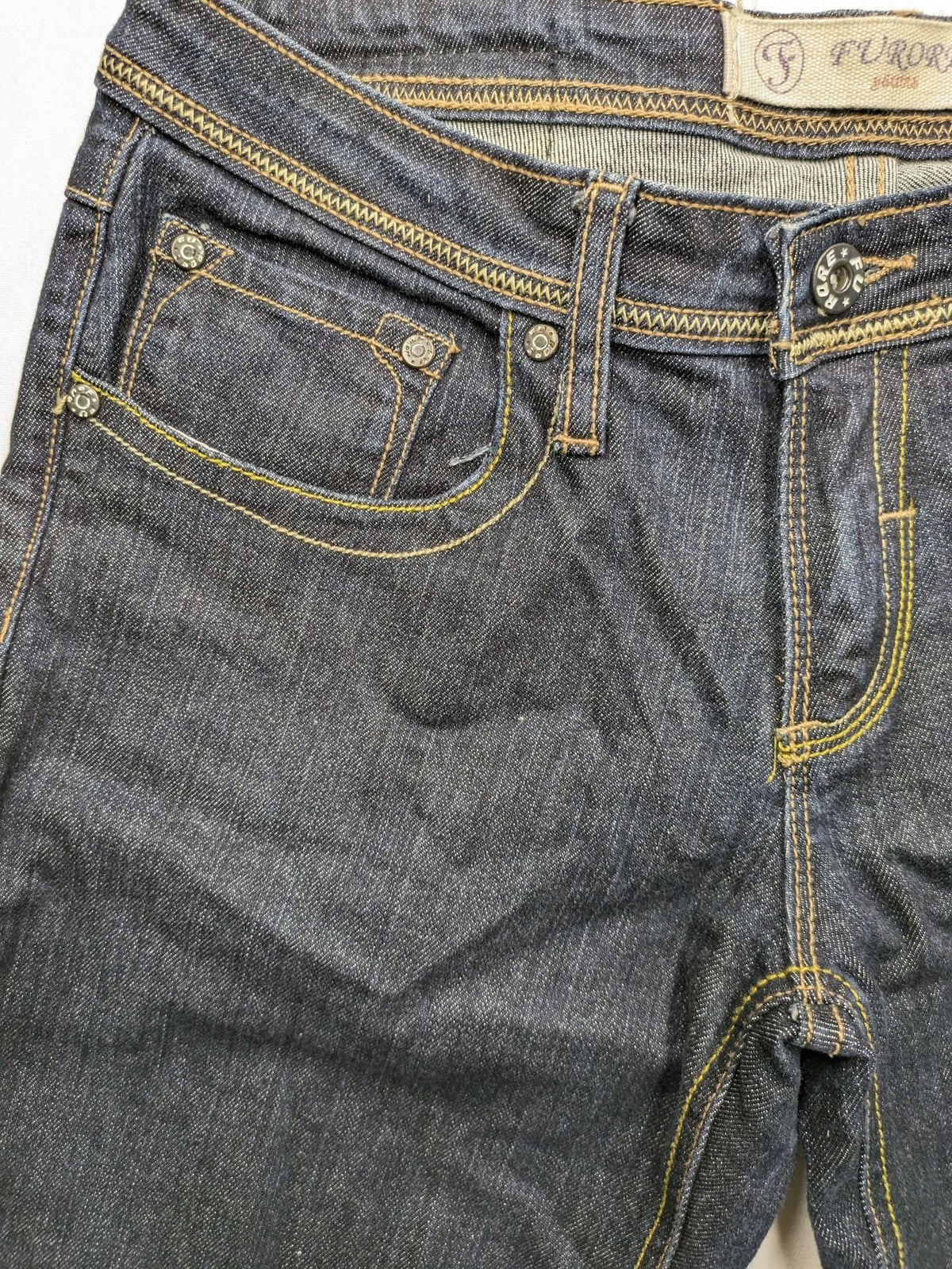 Furore blue straight jeans with yellow contrast stitching and zipper details.