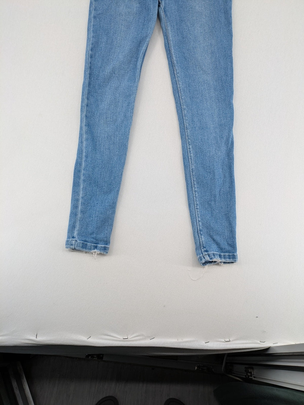 Metropoll blue high waist skinny jeans with frayed hem and classic 5-pocket design.