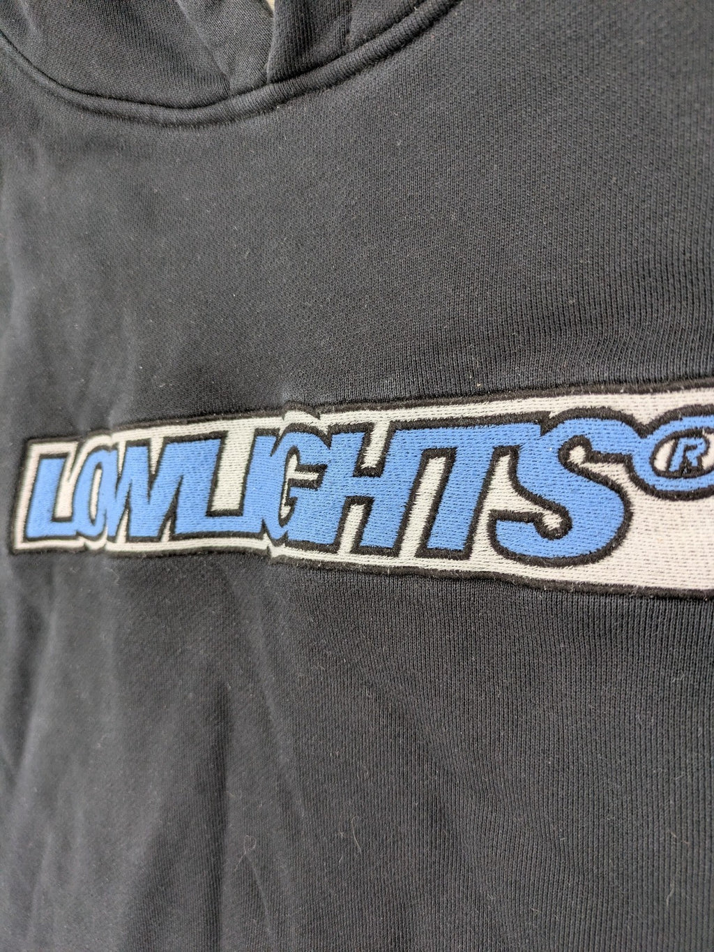 Lowlights Studios grey hoodie with embroidered logo and kangaroo pocket, 100% cotton.
