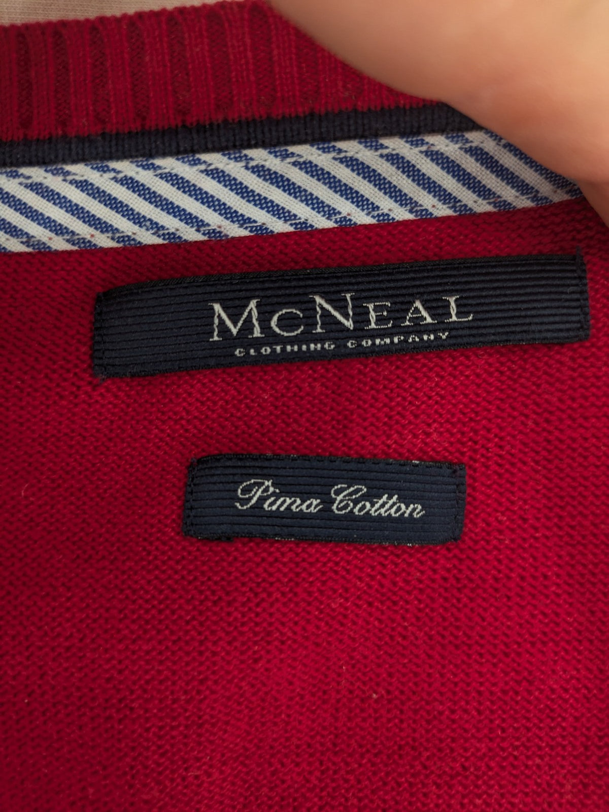 McNeal red turtle neck jumper V-neck design with ribbed cuffs and hem.