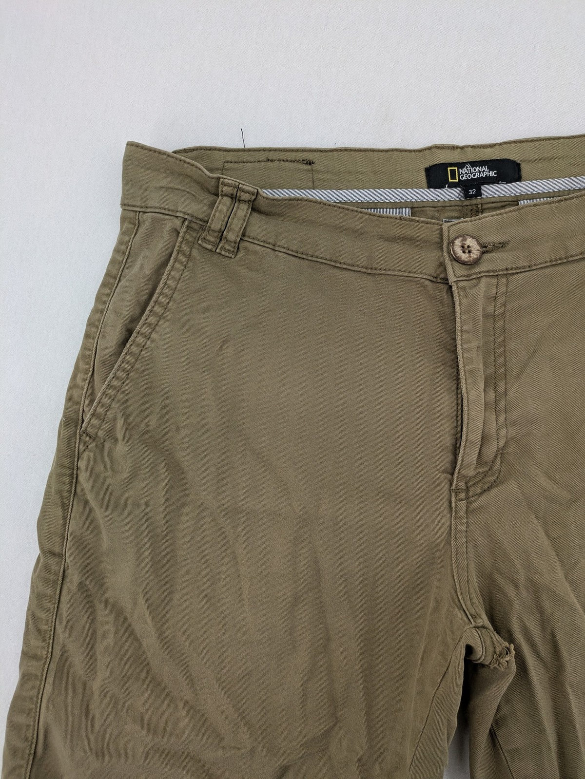 National Geographic khaki shorts flat front design with subtle logo patch
