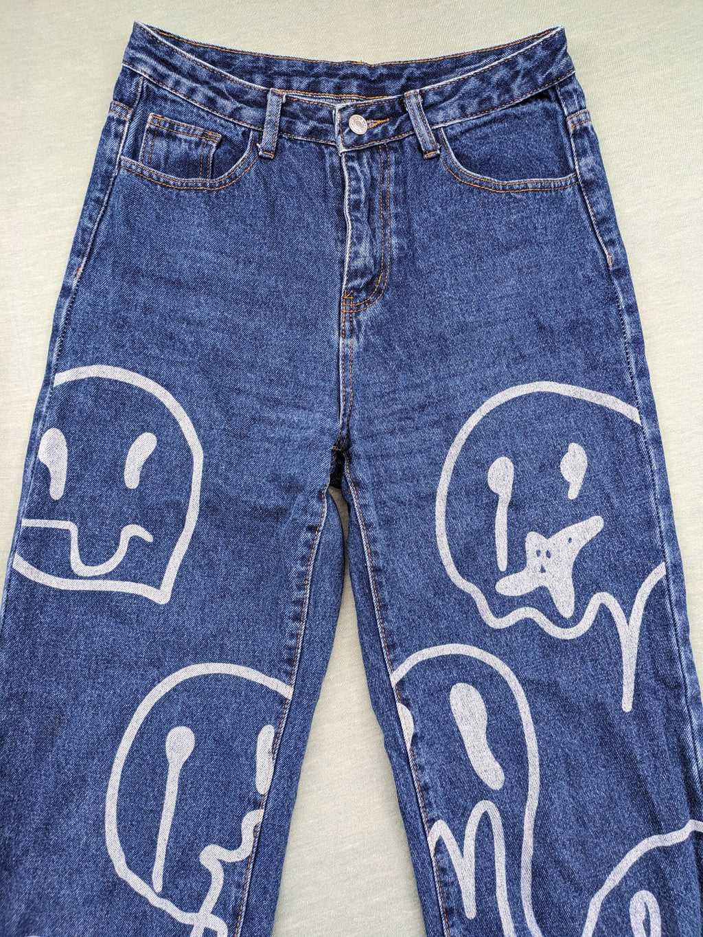 SHEIN blue wide-leg jeans high waist with white smiley face graphics and classic 5-pocket design.