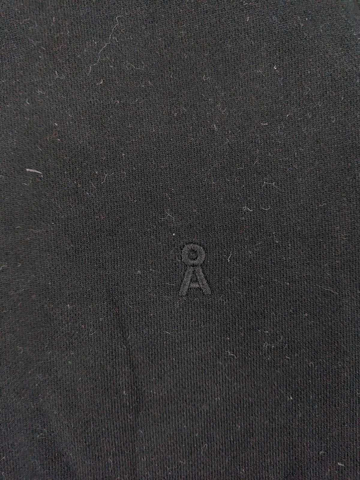 Armedangels black turtle neck jumper with embroidered logo, made from 100% organic cotton.