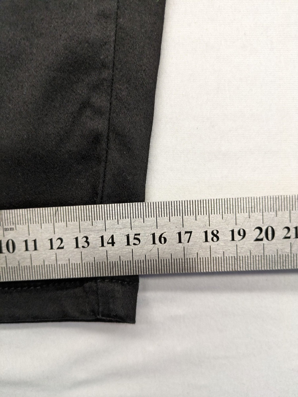 Colac black straight jeans high waist with double button, zipper pockets, and stretch material.