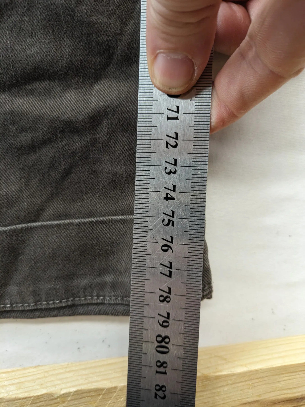 Jacob Cohen black straight jeans with leather logo patch and zip fly, size 32.