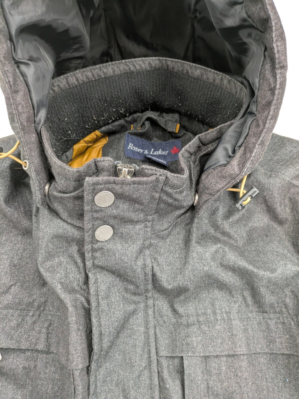 Rover & Lakes grey jacket with hood, quilted lining, and multiple pockets.
