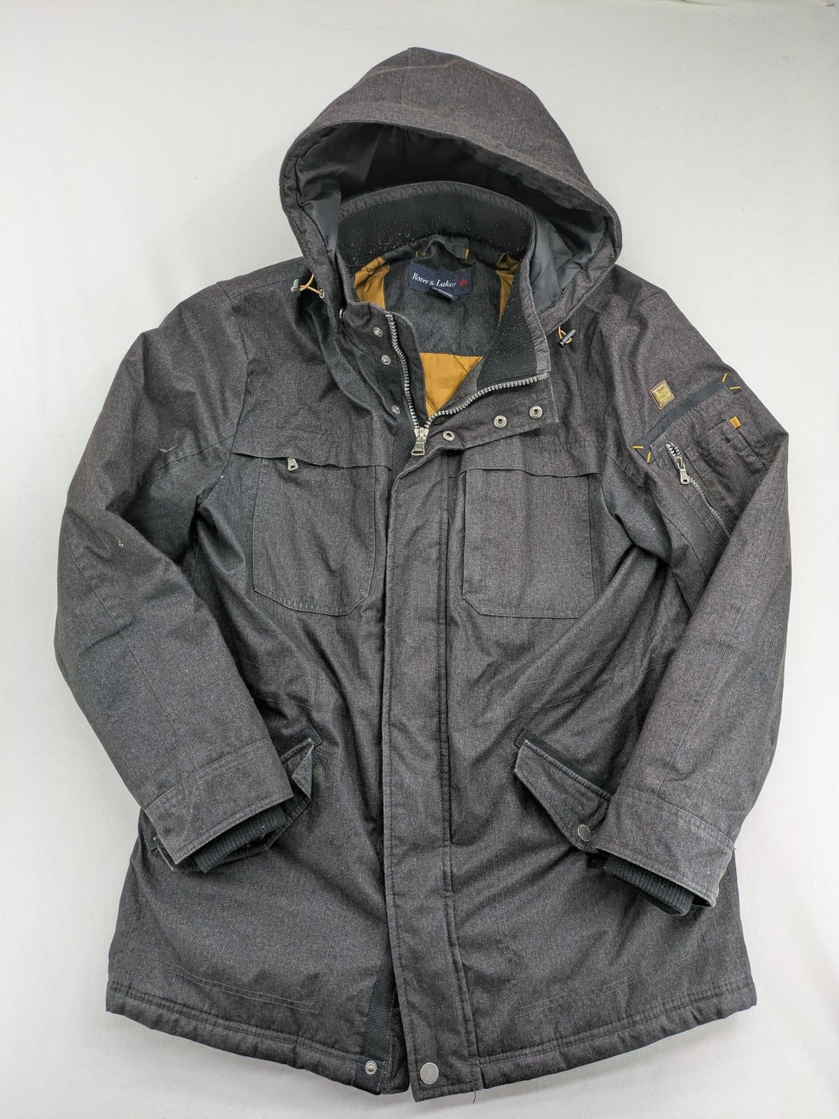 Rover & Lakes grey jacket with hood, quilted lining, and multiple pockets.