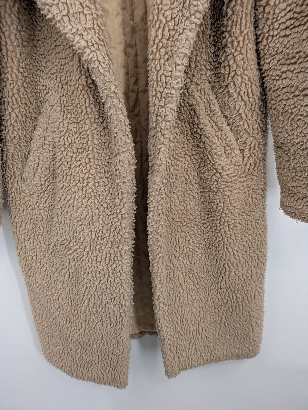 Clockhouse beige teddy coat longline design soft faux fur material with notched collar.
