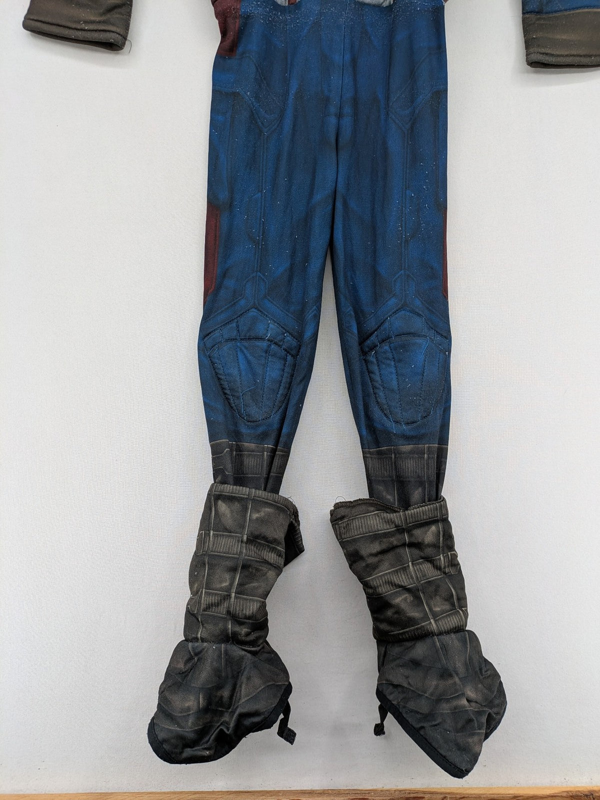 Captain America costume multi-coloured with padded muscle chest and shoulder details.