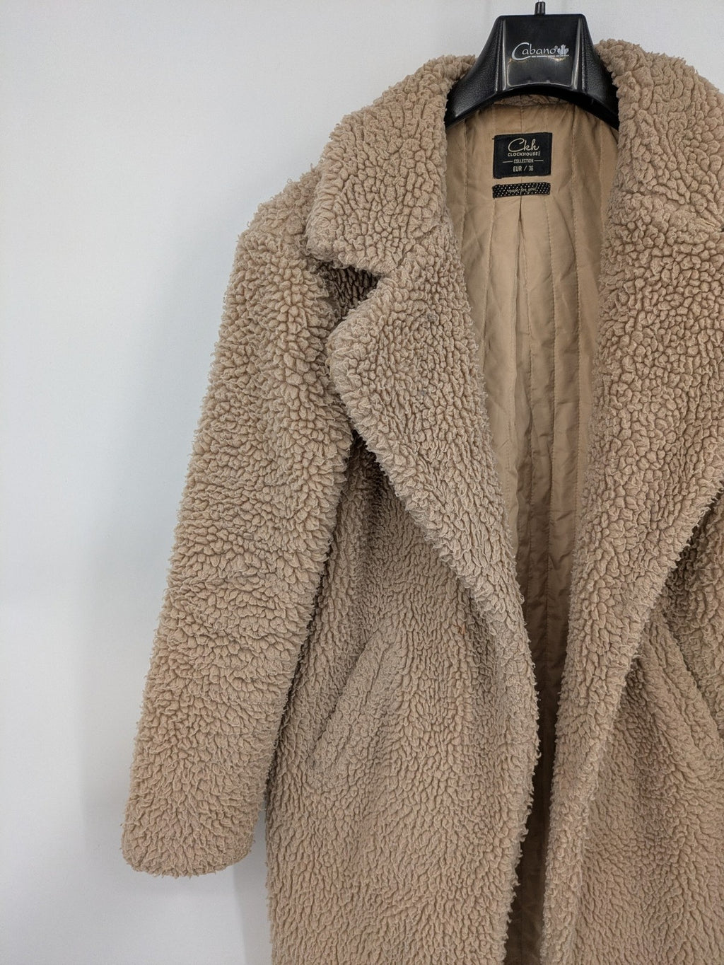 Clockhouse beige teddy coat longline design soft faux fur material with notched collar.