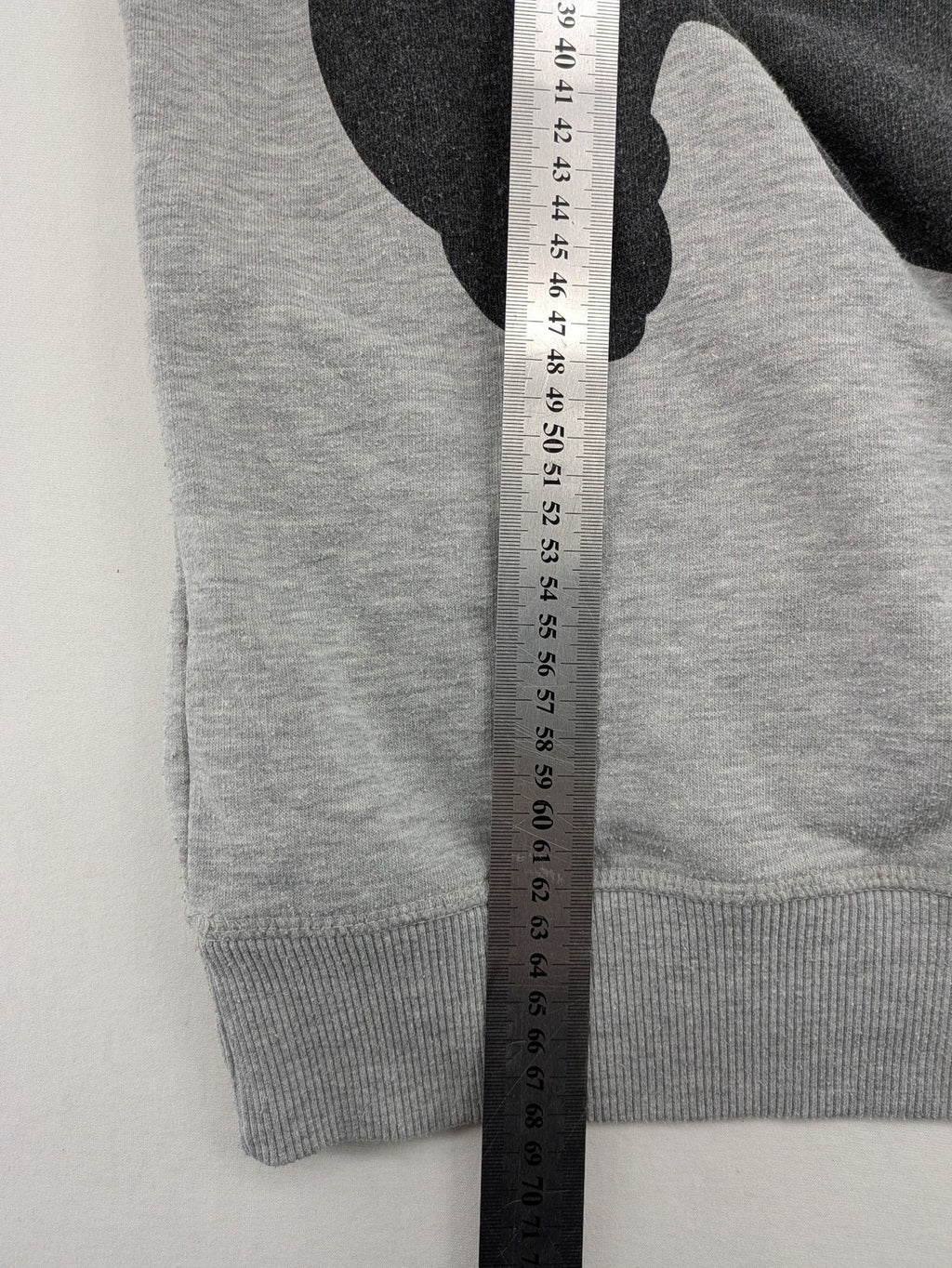 Disney turtle neck jumper multi with colorful Mickey Mouse graphic and "MR. MOUSE" sleeve text.