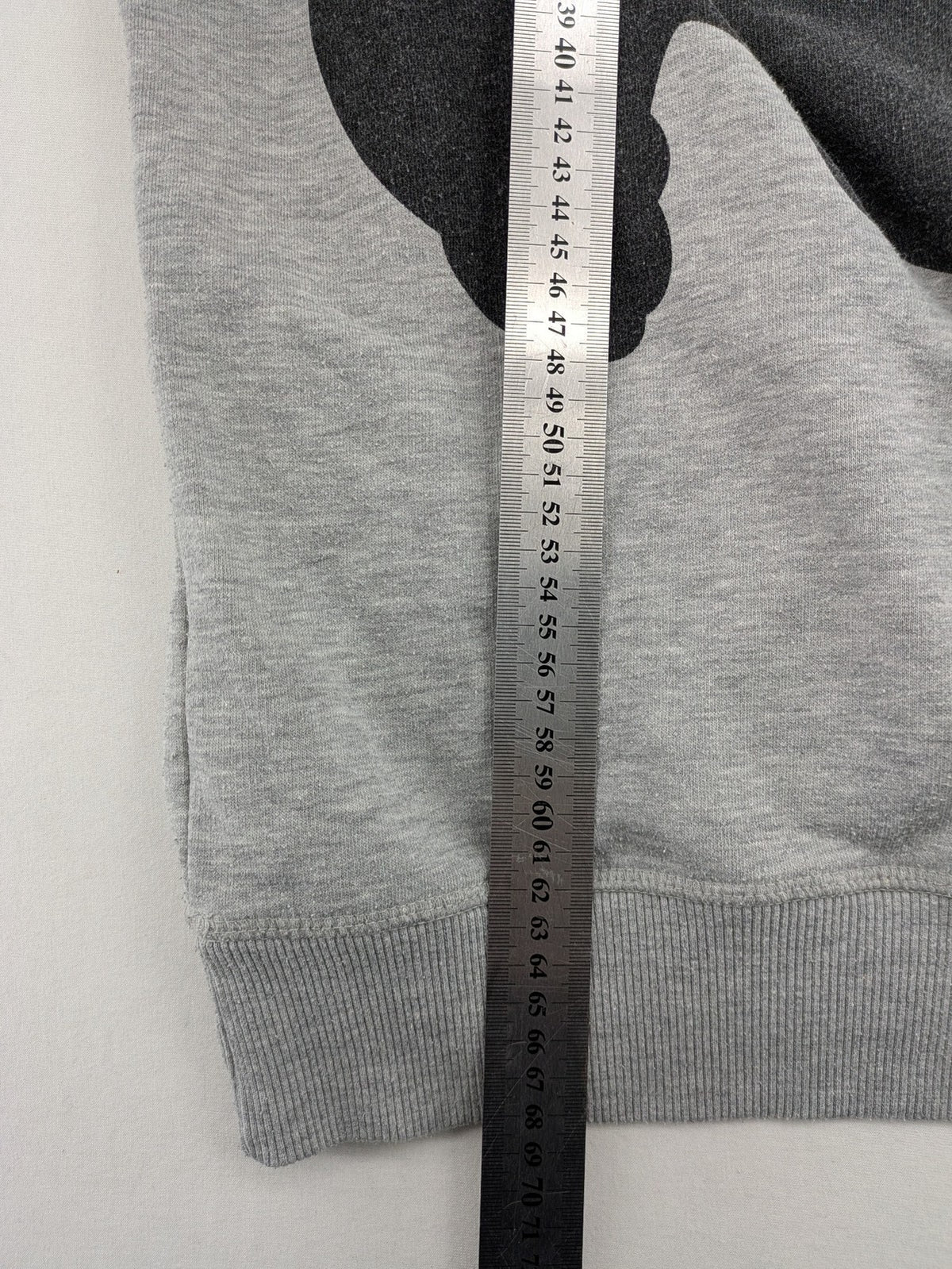 Disney turtle neck jumper multi with colorful Mickey Mouse graphic and "MR. MOUSE" sleeve text.