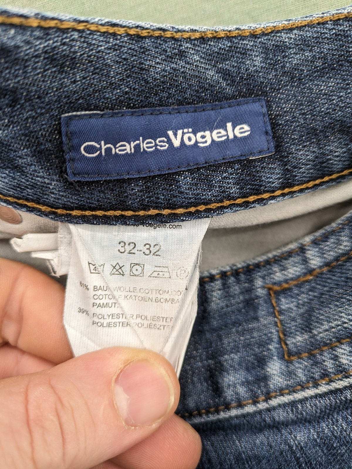 Charles Vögele blue straight jeans with classic 5-pocket style and regular waist.