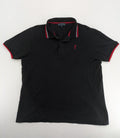 Sir Raymond Tailor black polo shirt with red and white striped collar, embroidered golfer logo.