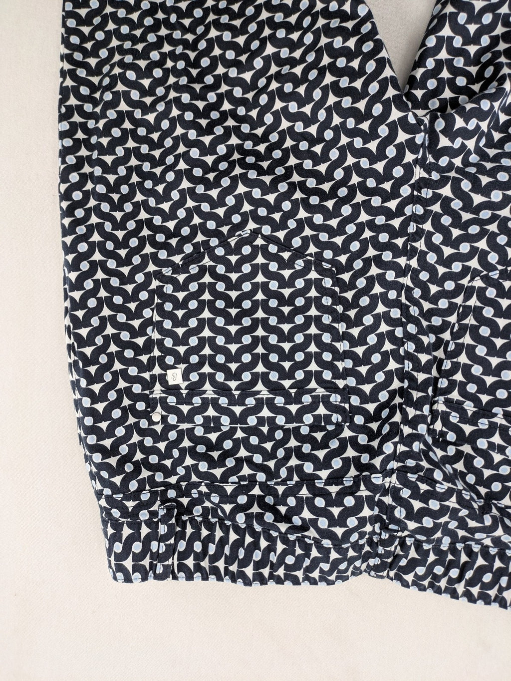 Bonita navy pants with geometric pattern, stretch material, and classic zip fly closure.