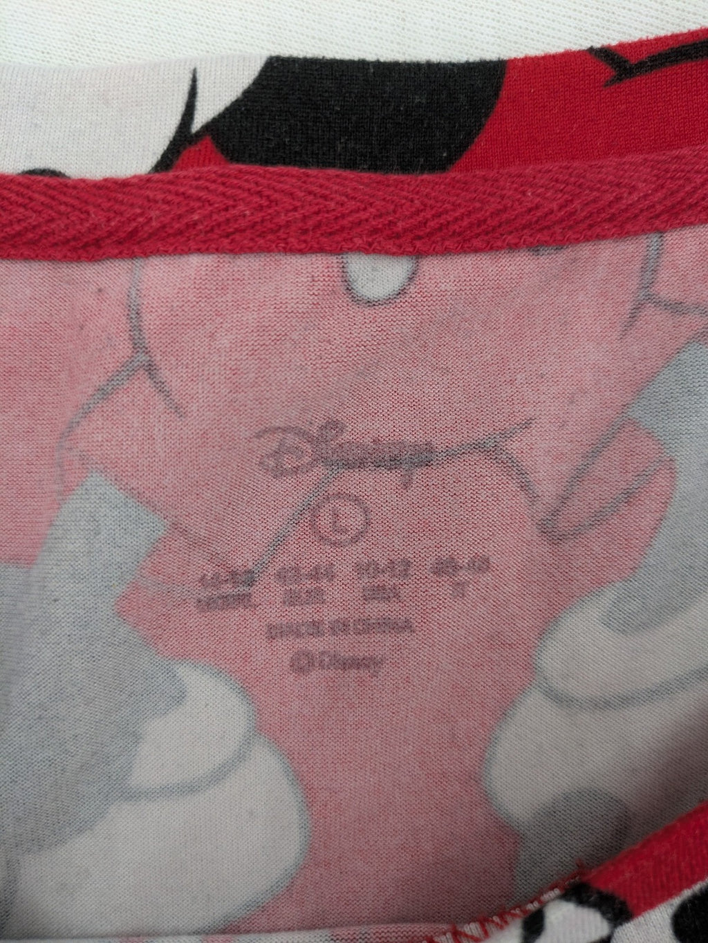 Disney loungewear set red and black with allover Mickey Mouse print and long sleeves.