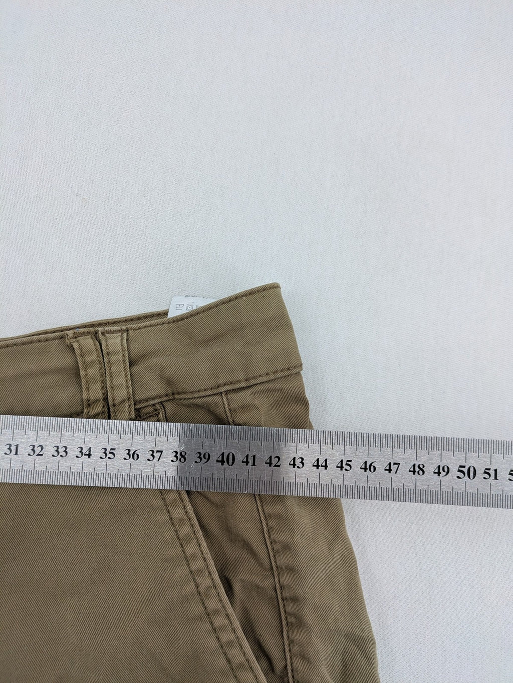 National Geographic khaki shorts flat front design with subtle logo patch