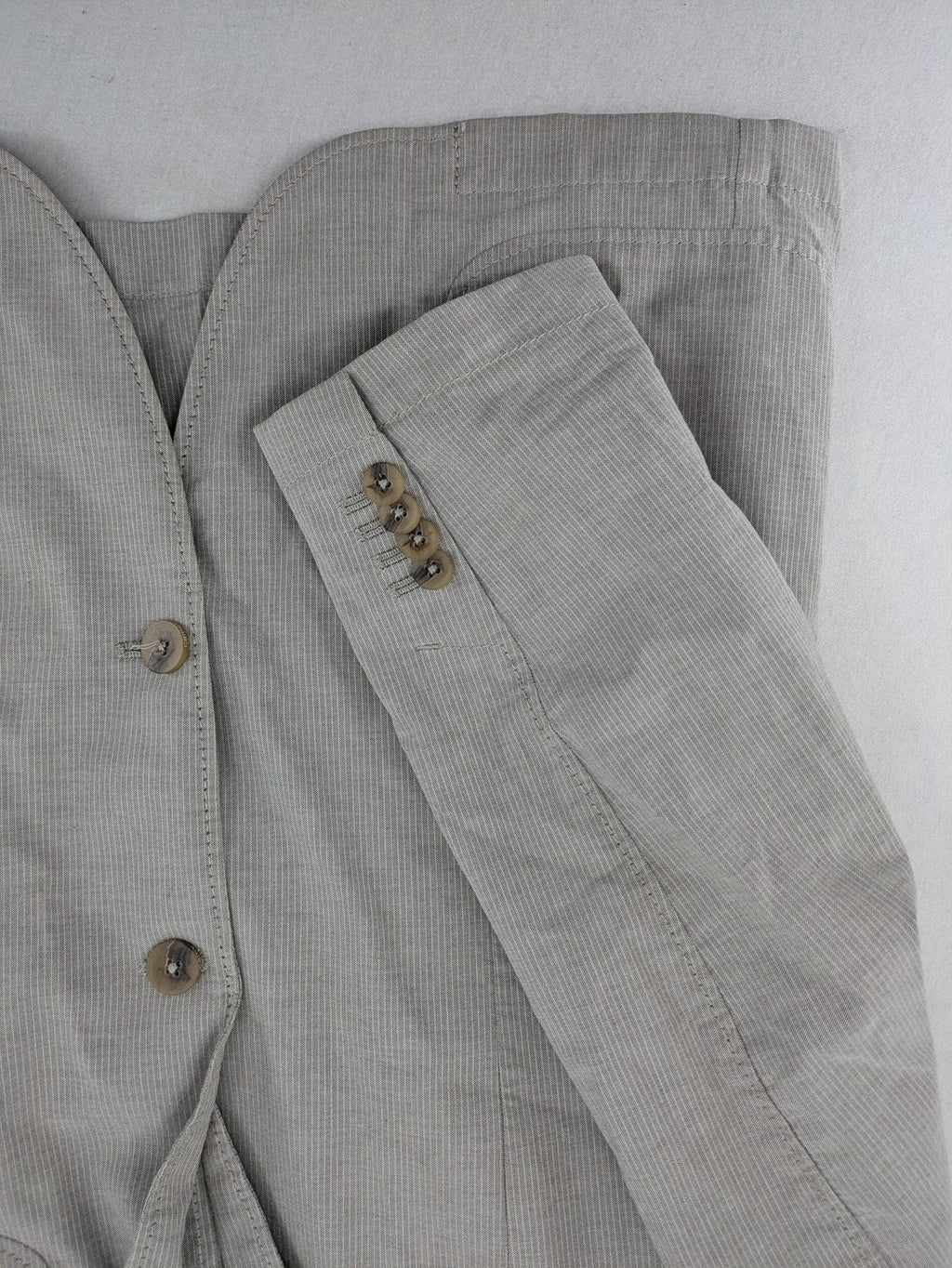 Camel Active grey cord blazer with classic two-button closure and practical zippered inner pockets.