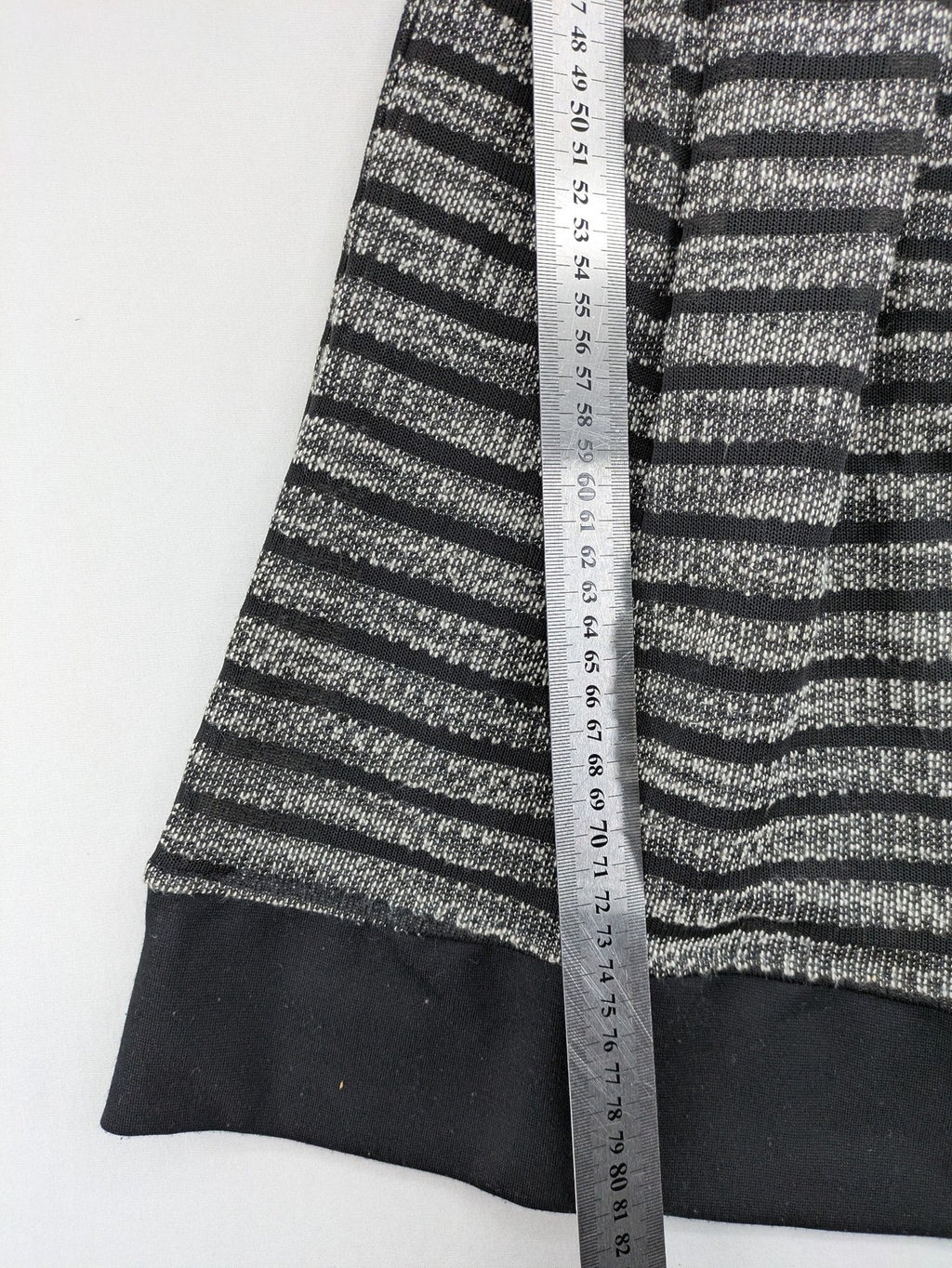 Stradivarius black and silver metallic fit and flare dress with sleeveless design and round neckline.