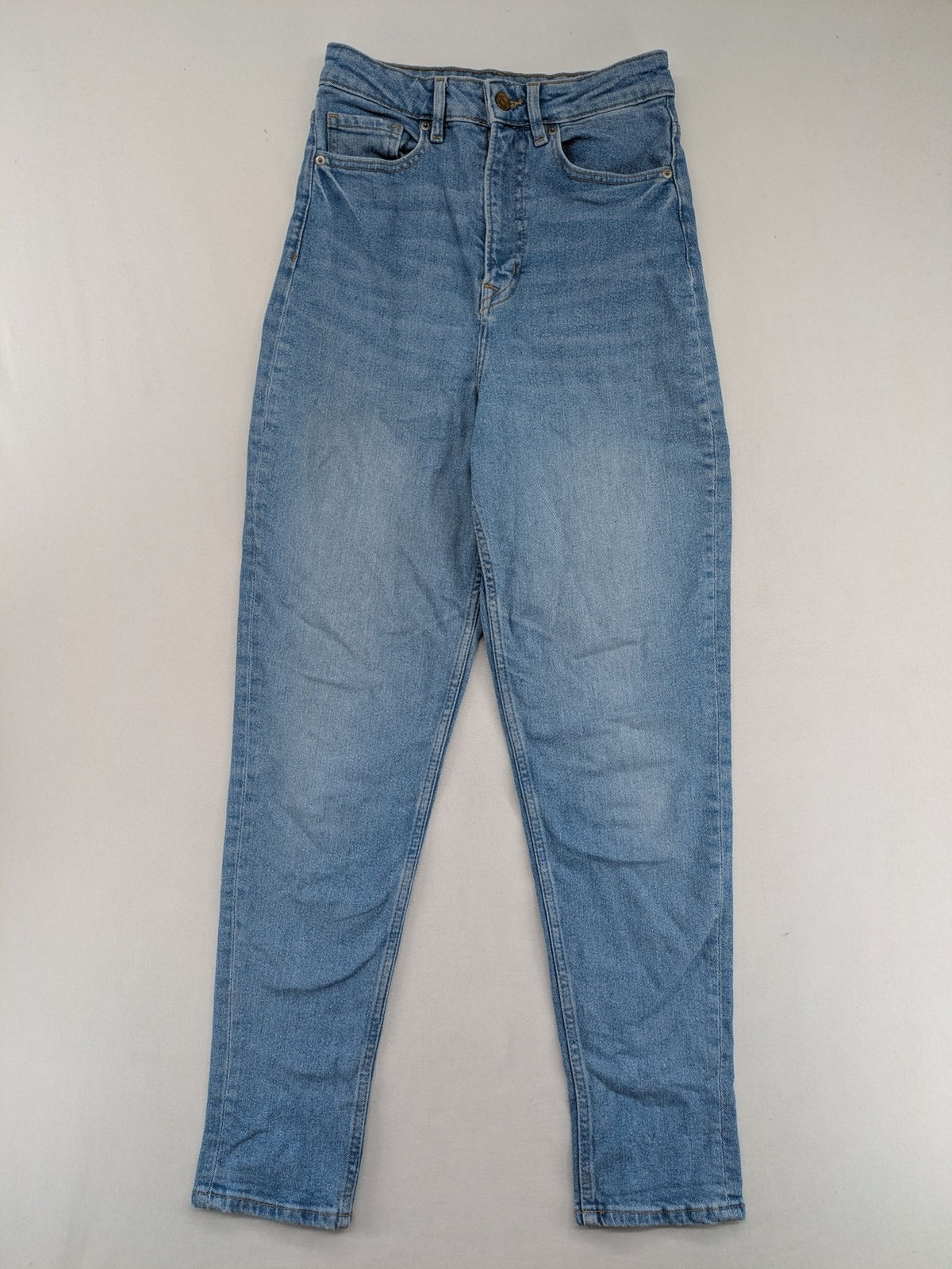 H&M Divided blue mom jeans high waist tapered fit with classic wash and durable cotton blend.