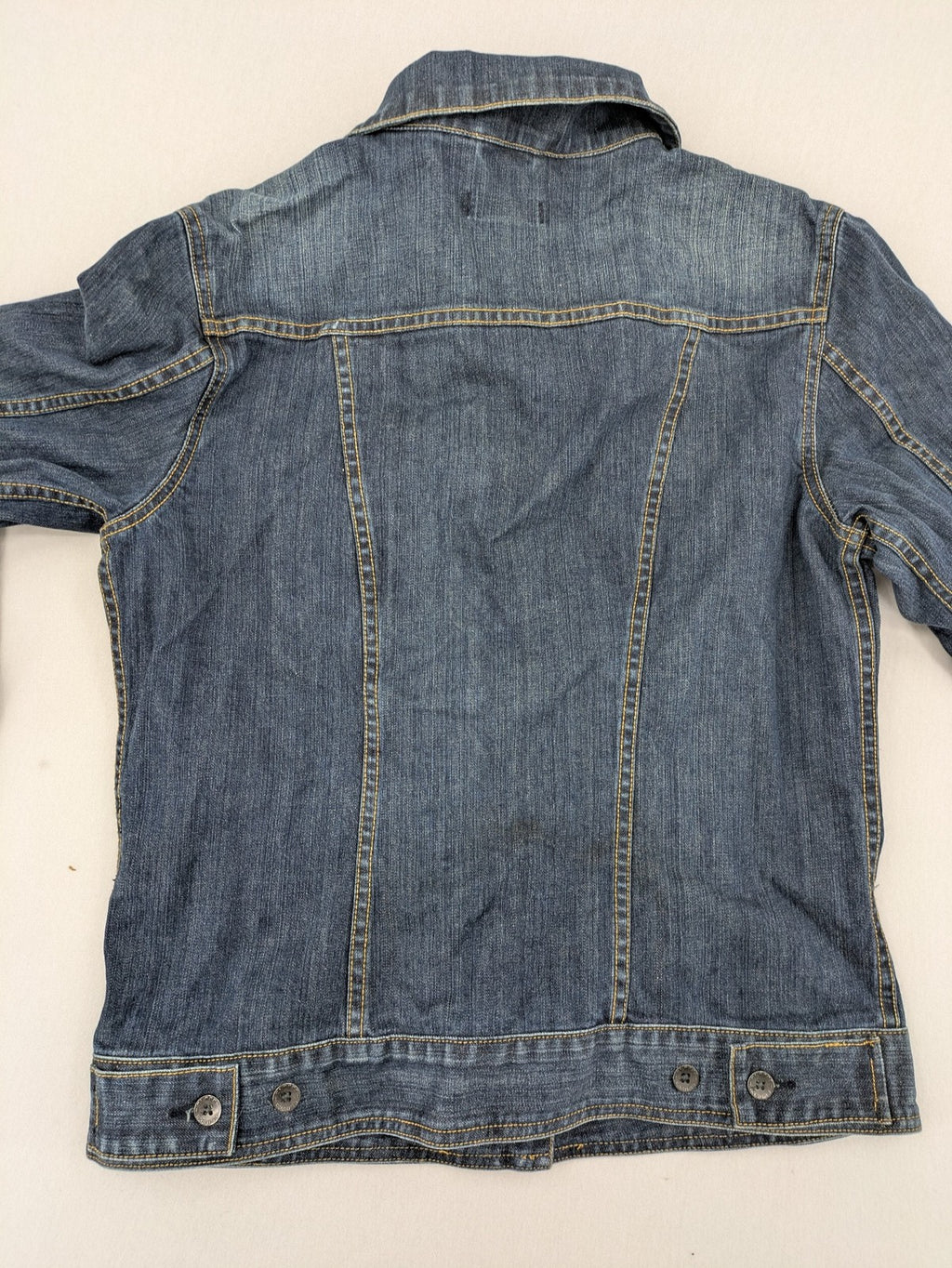 CLOSED blue denim trucker jacket with button front and two chest pockets.