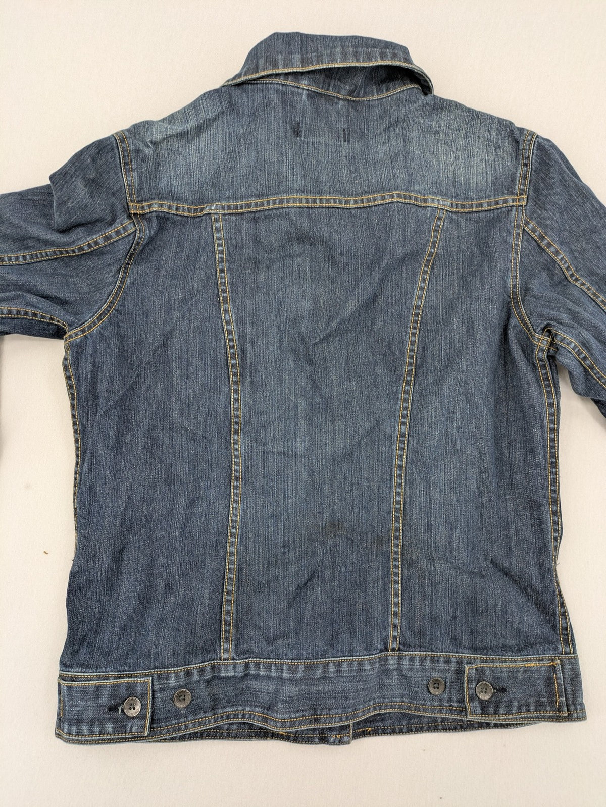 CLOSED blue denim trucker jacket with button front and two chest pockets.