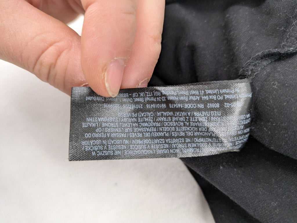 Primark black graphic t-shirt featuring yellow and white Pornhub logo on chest.