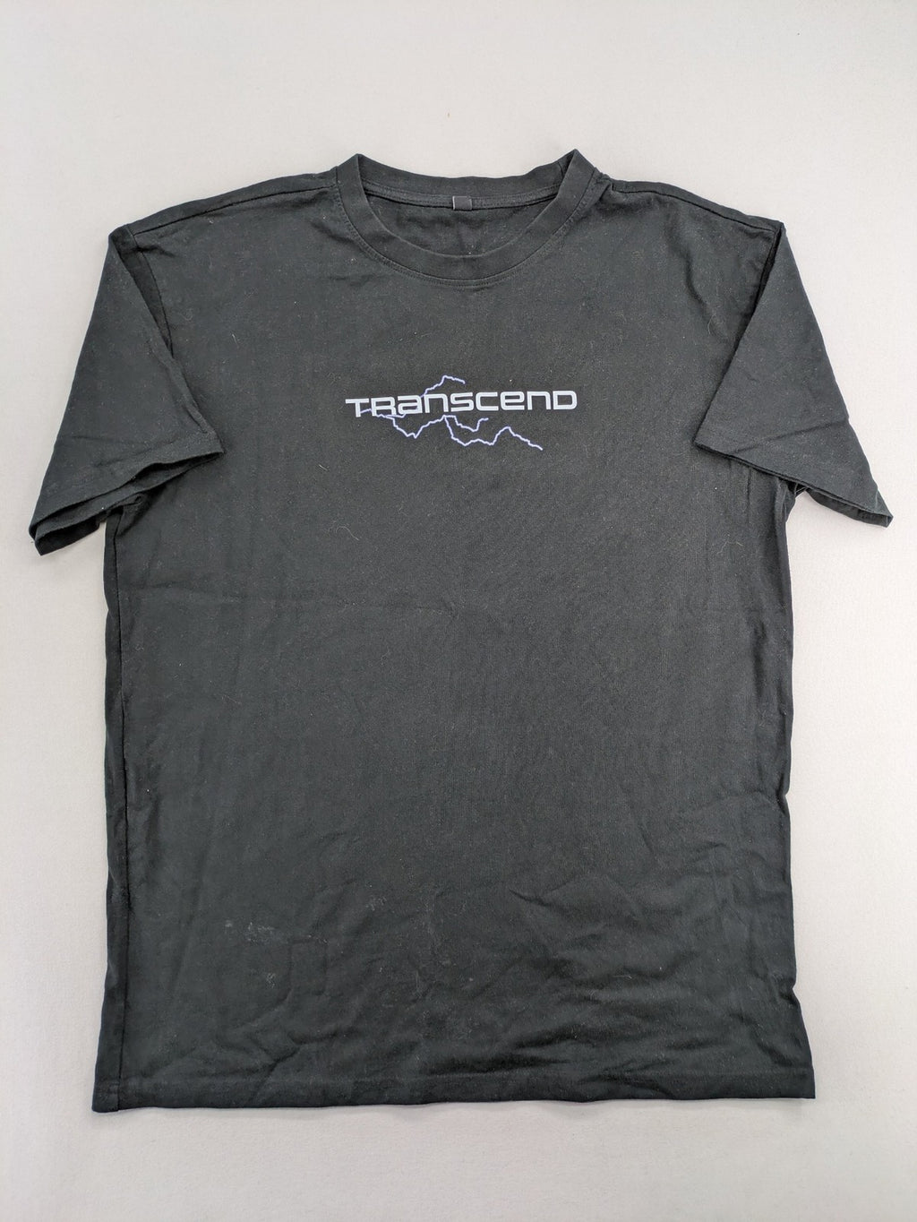 Transcend multi graphic t-shirt black cotton "Go Beyond The Limits" print on back.
