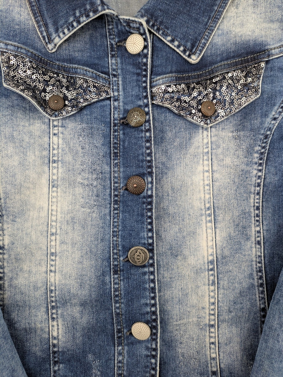 TREDY blue denim jacket with sequins, lace trim, and fitted design.