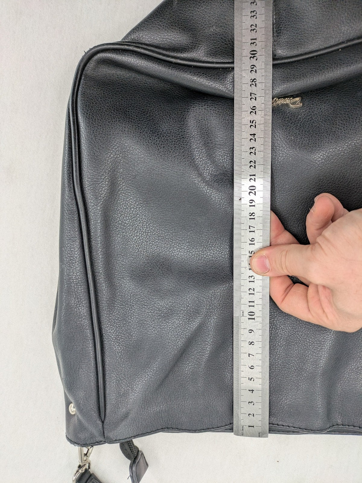 David Jones black hobo handbag pebbled PU leather with silver hardware and zipper closure.