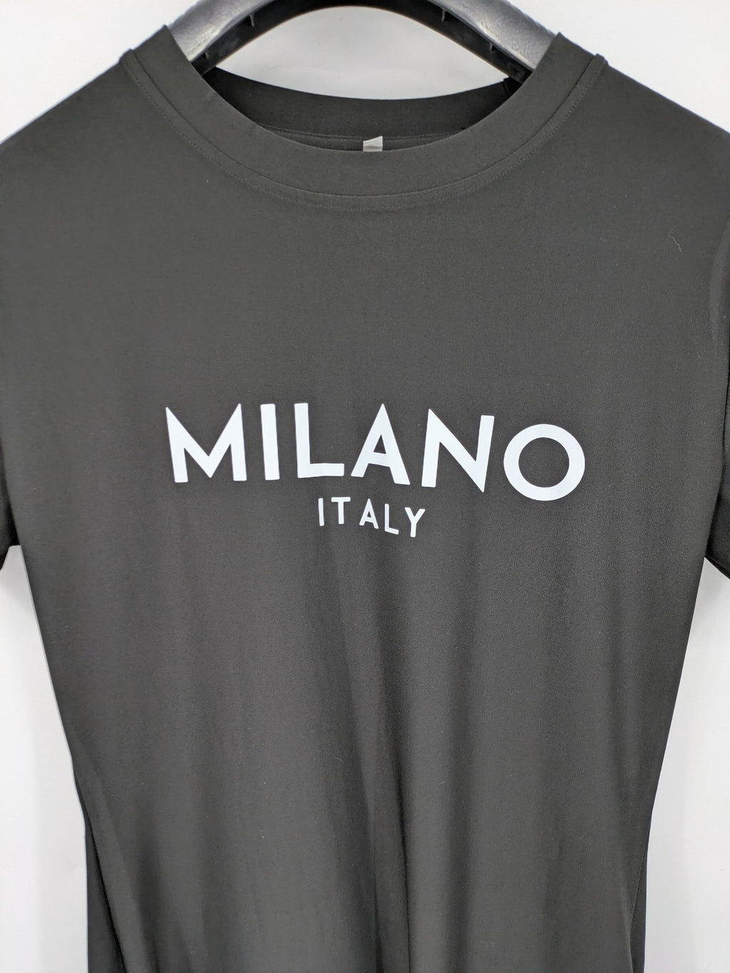 Milano black bodycon T-shirt dress with stylish print and side slit detail.