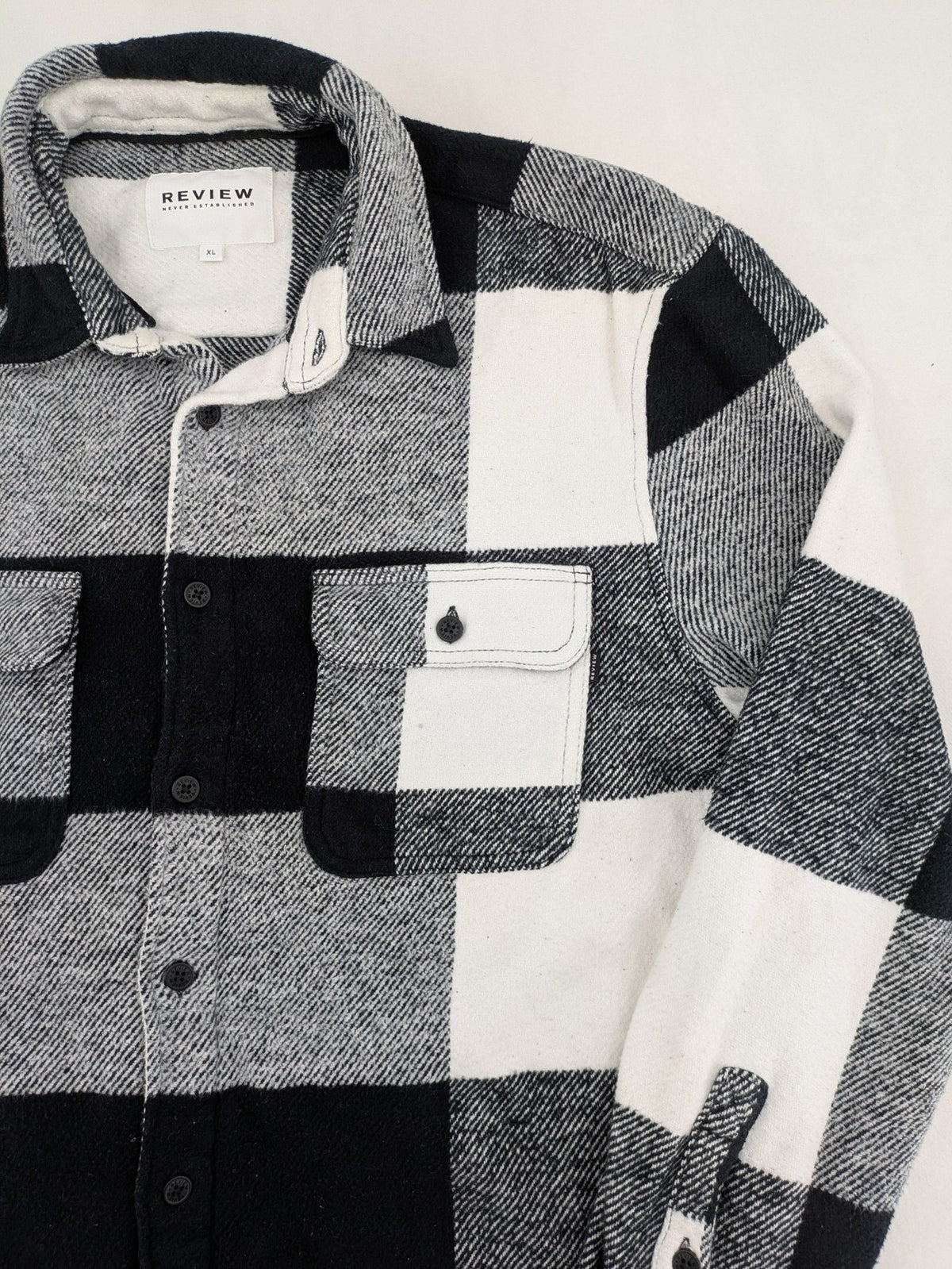 Review flannel jacket black white checkered pattern cotton material with chest pockets