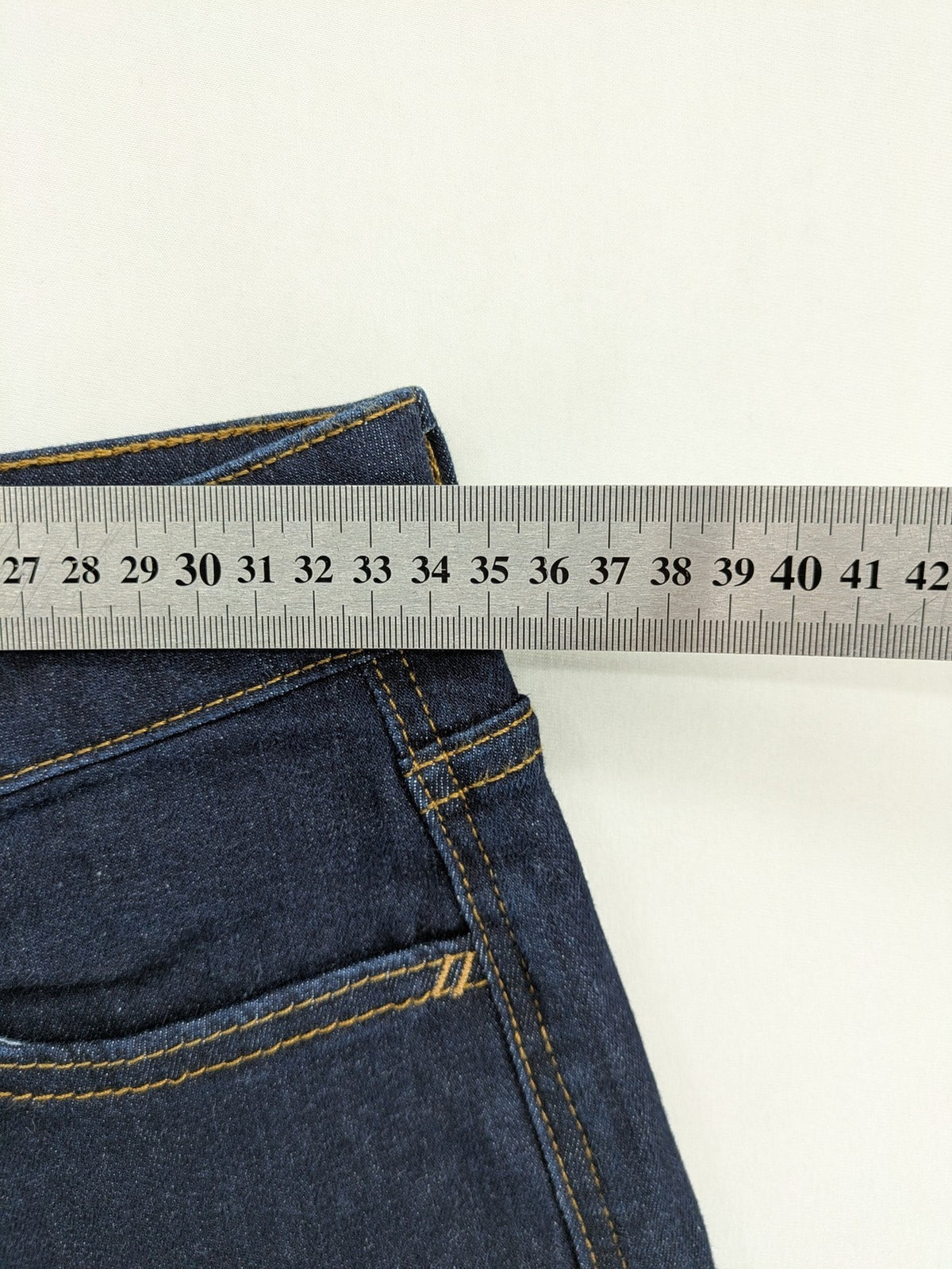 Esprit blue straight leg jeans with contrasting stitching and mid-rise fit.