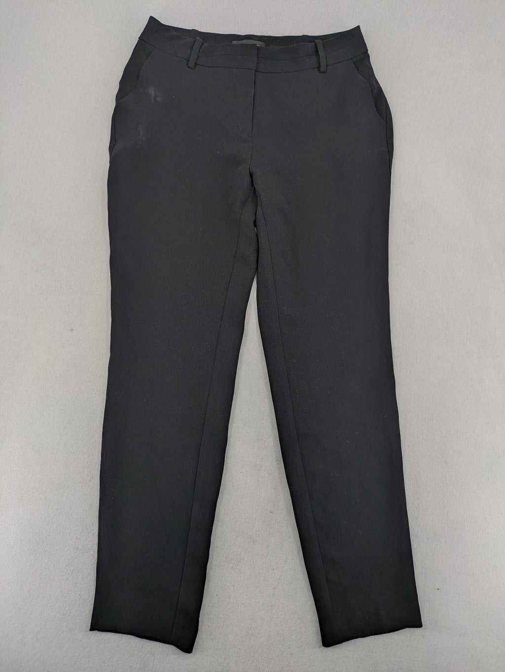 Mango Suit black trousers with zipper, belt loops, and front slant pockets.