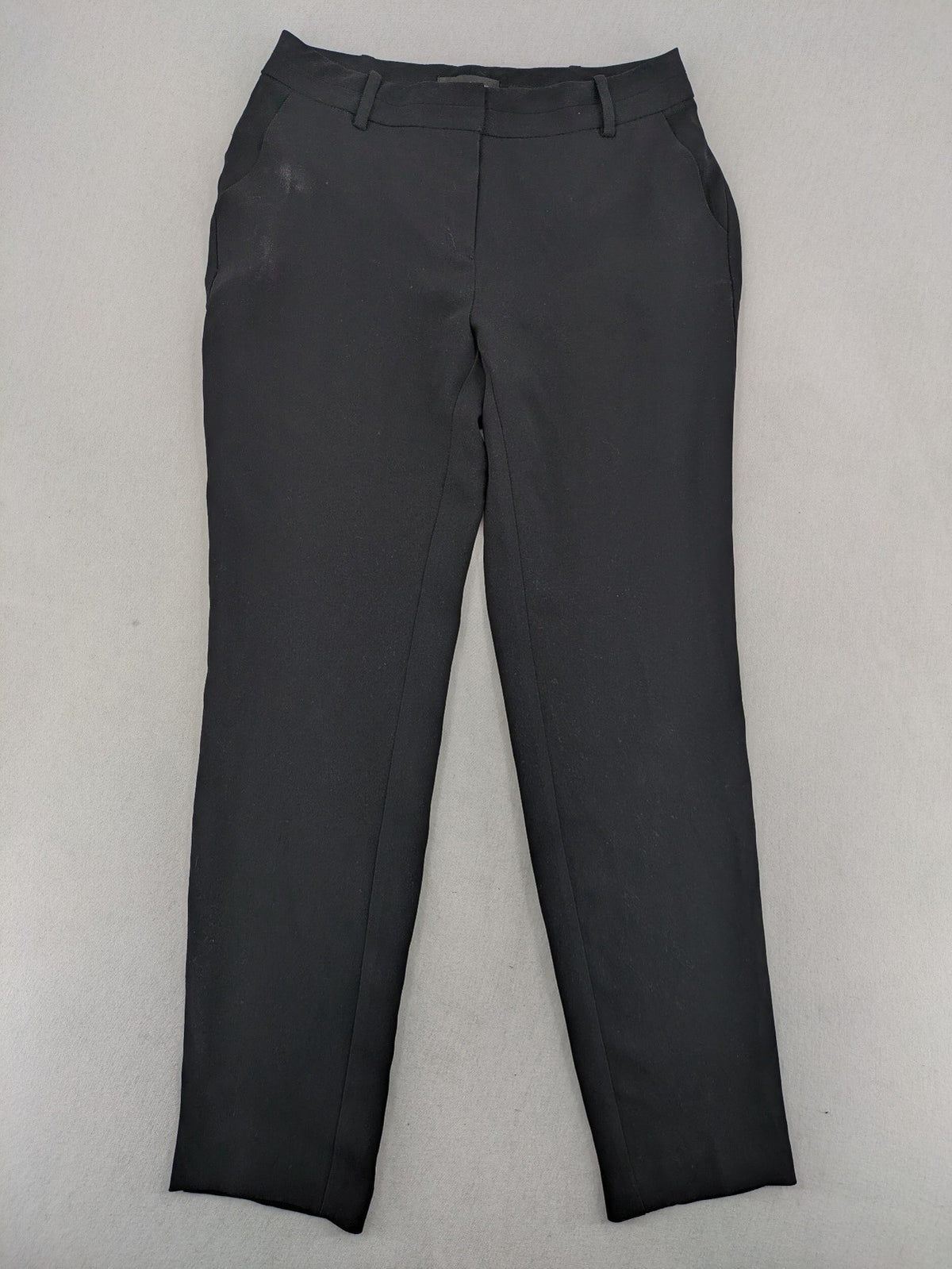 Mango Suit black trousers with zipper, belt loops, and front slant pockets.