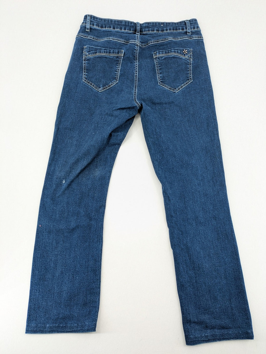 Miss Good blue straight jeans with 5-pocket design and decorative metal accent.