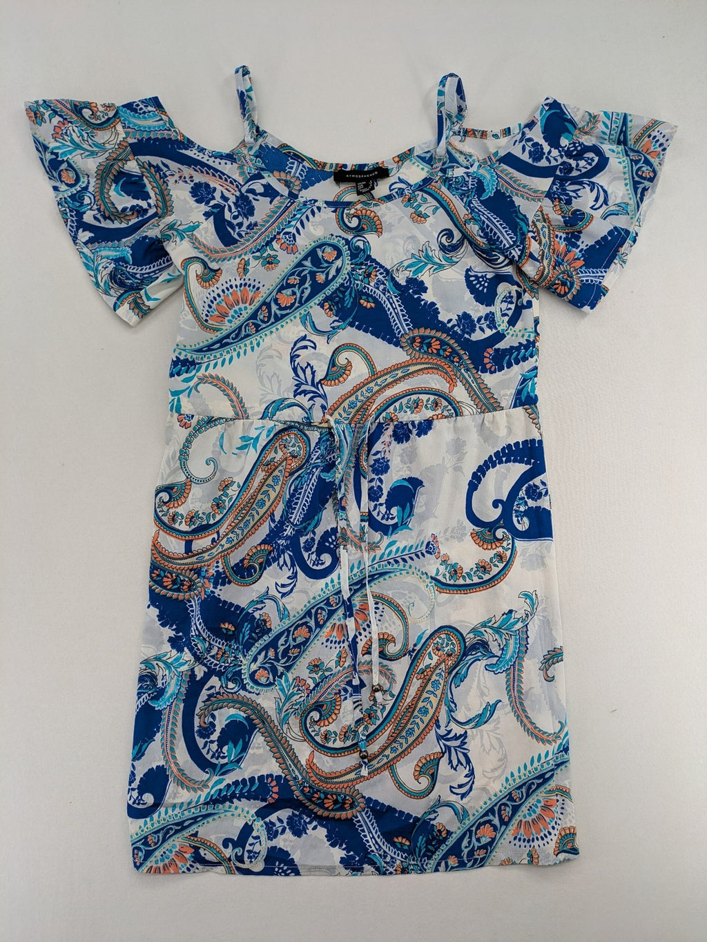 Atmosphere orange summer dress with colorful paisley pattern and cold shoulder design.