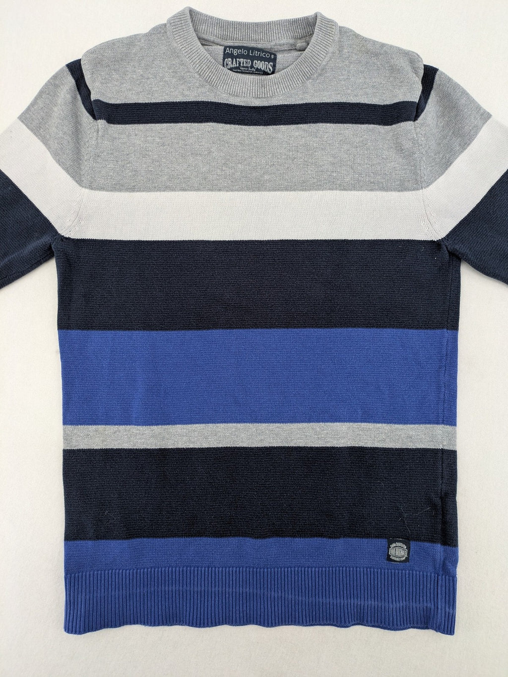Angelo Litrico navy knit jumper striped pattern in blue, grey, and white, cotton material.