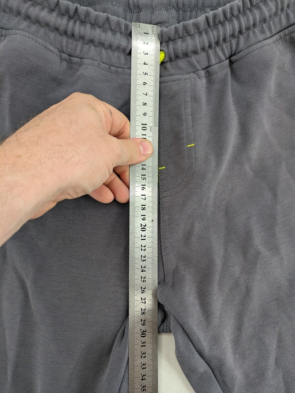 US Polo Assn grey sweatpants with light green drawstring and subtle logo detail.