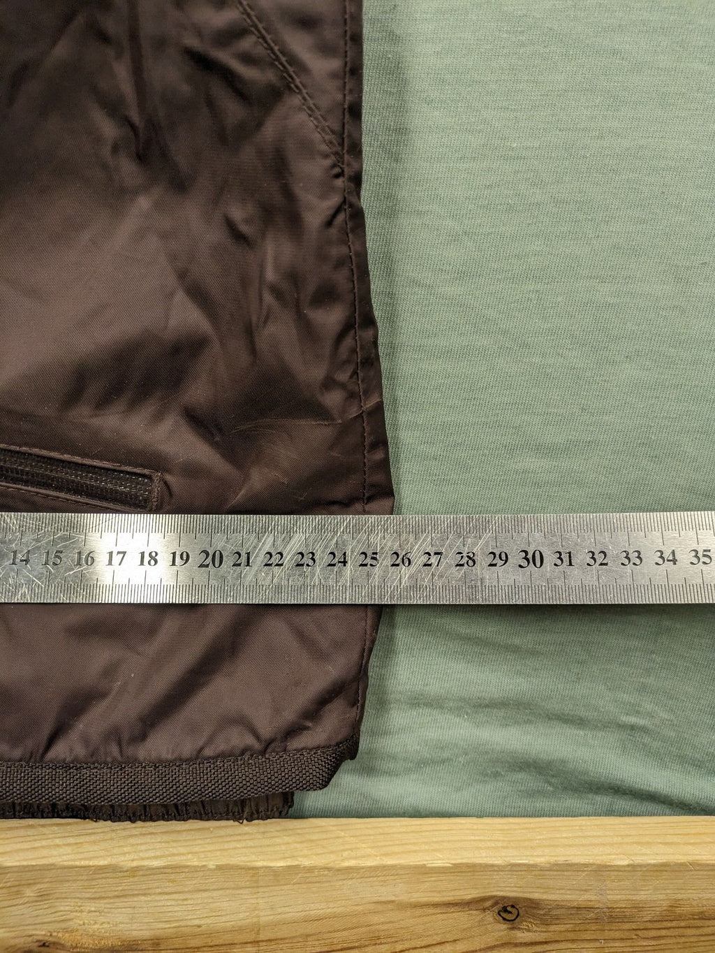 Thinsulate black and blue ski jumpsuit with hood and zippered pockets.