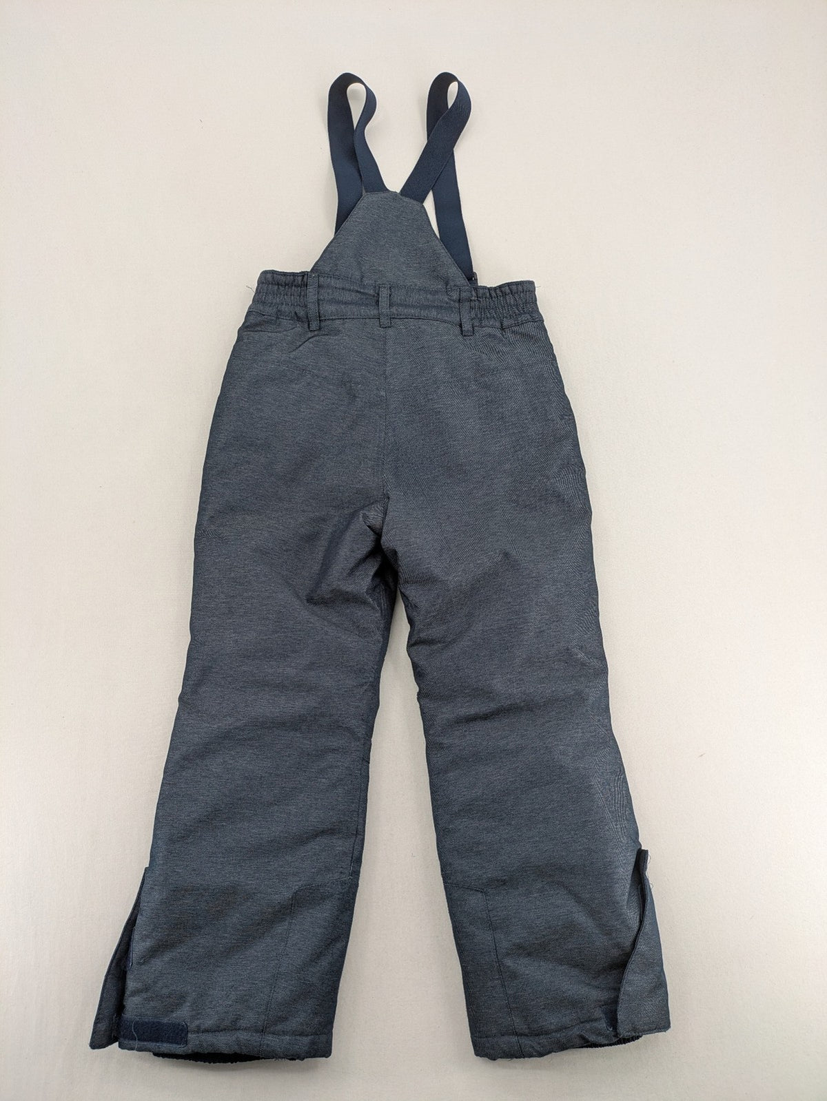 Topolino grey snow pants with adjustable straps and durable insulated material.