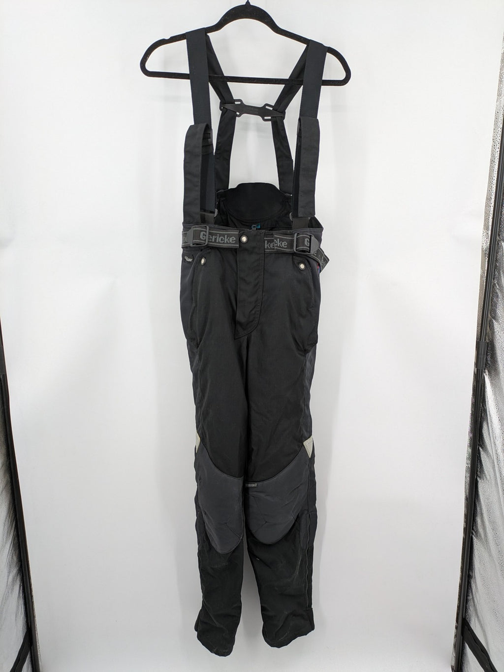 Hein Gericke black chaps with adjustable suspenders, made from durable Cordura and Kevlar.