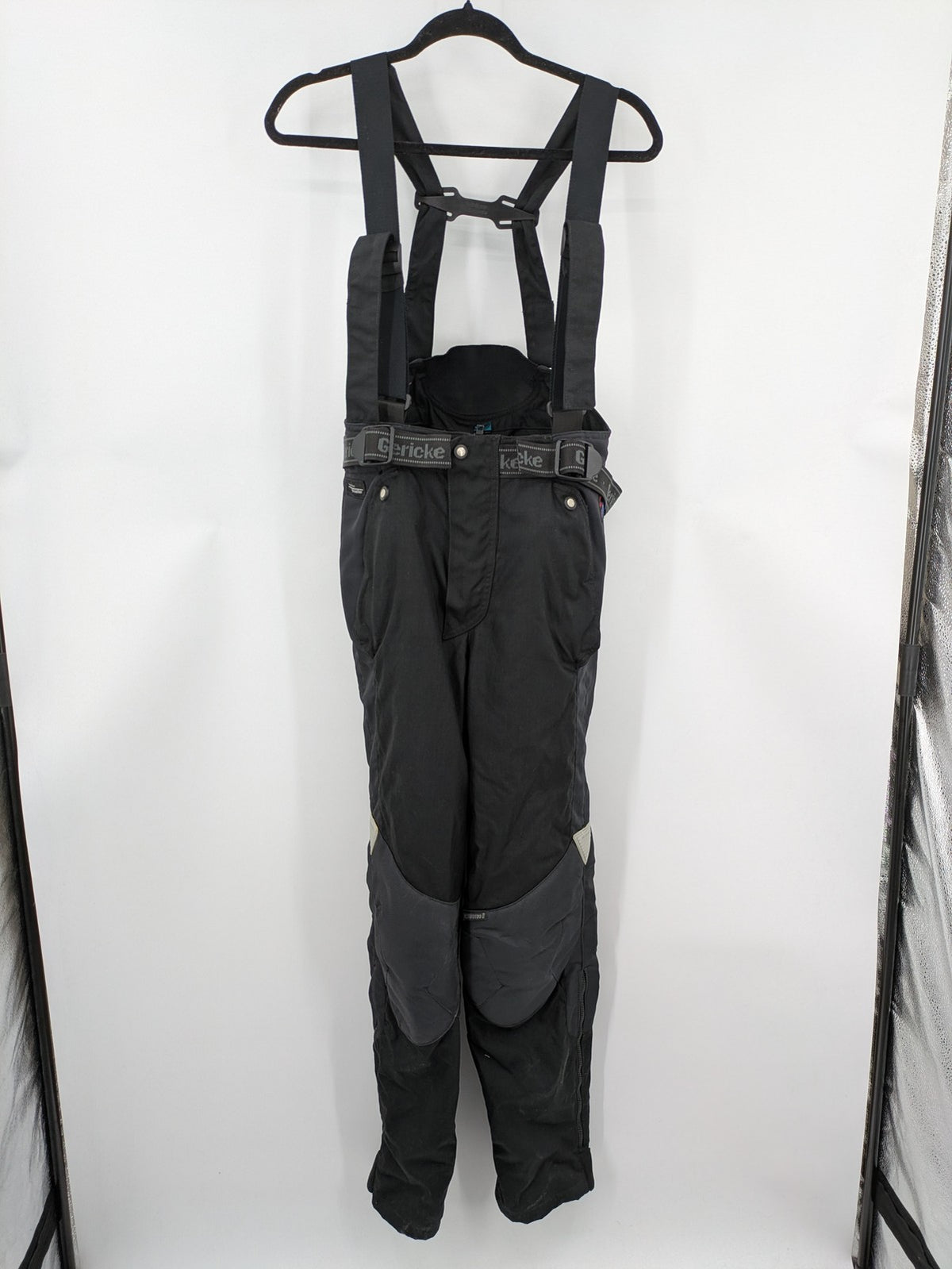 Hein Gericke black chaps with adjustable suspenders, made from durable Cordura and Kevlar.